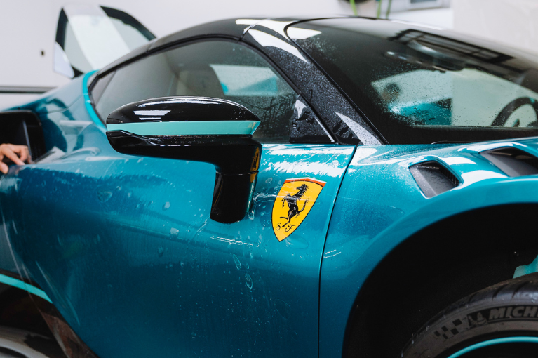 Ferrari SF90XX Spider protected with XPEL Ultimate Plus PPF by TR3 Performance in South Florida : high-gloss paint protection film for exotic and hypercars.